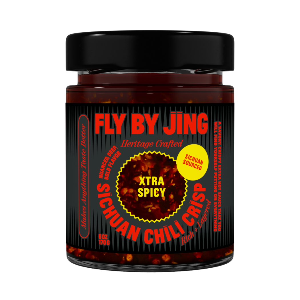 Jar of Fly By Jing Sichuan Chili Crisp with black lid on a white background