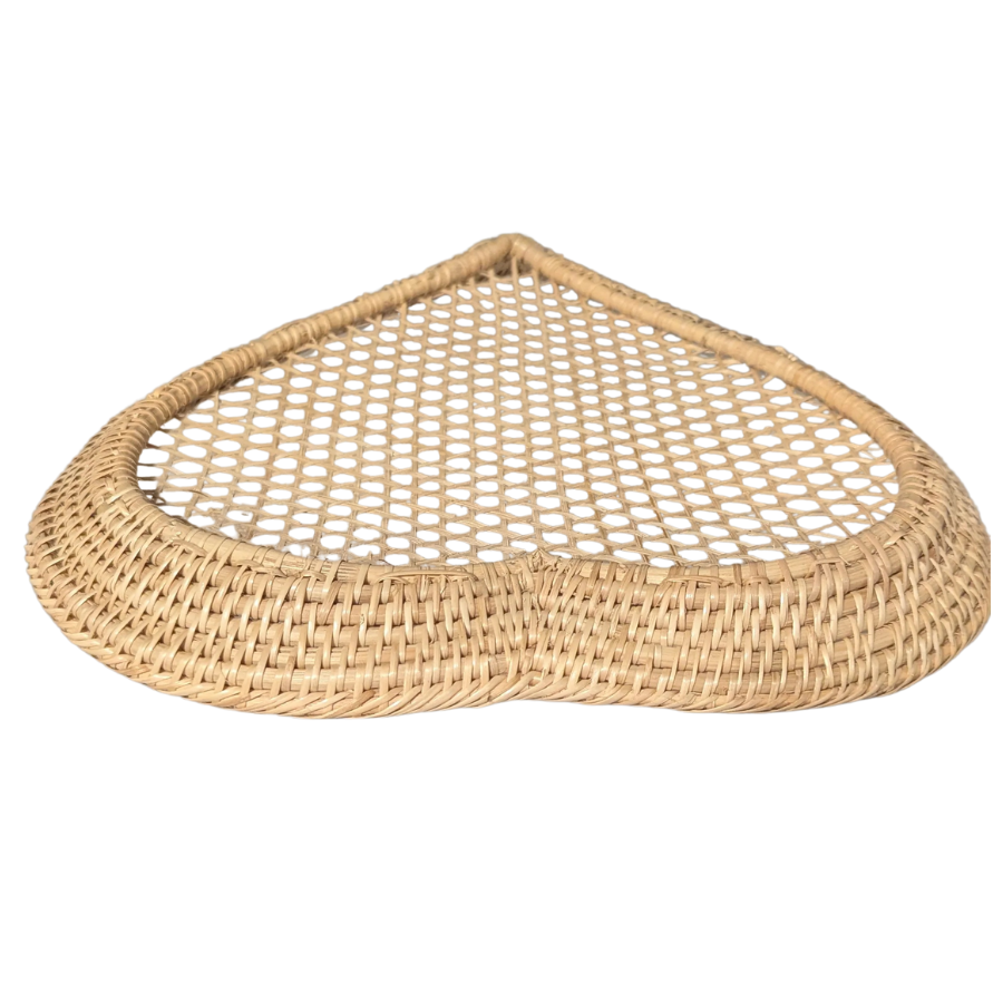 Top view of the Heart-shaped bamboo woven plate on a white background