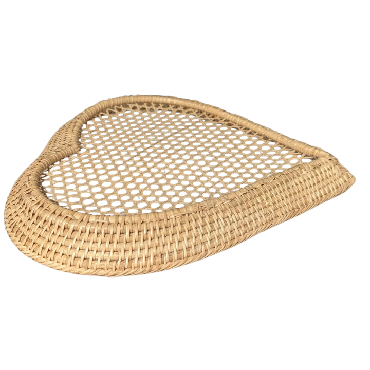 Left view of the Heart-shaped bamboo woven plate on a white background