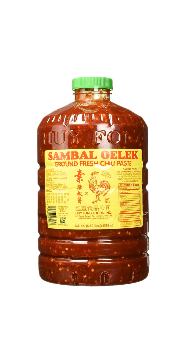 A jar of Huy Fong Sambal Oelek Ground Fresh Chili Paste with a green lid and a picture of a rooster on yellow label.t.