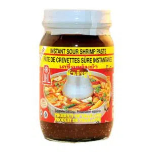 An 8oz glass jar of instant sour shrimp paste with a colorful red and yellow label with an image of steel hotpot image with surrounding vegetables. 