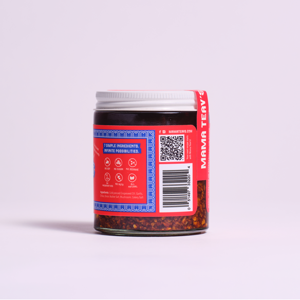 Jar with a red label on a light gray background