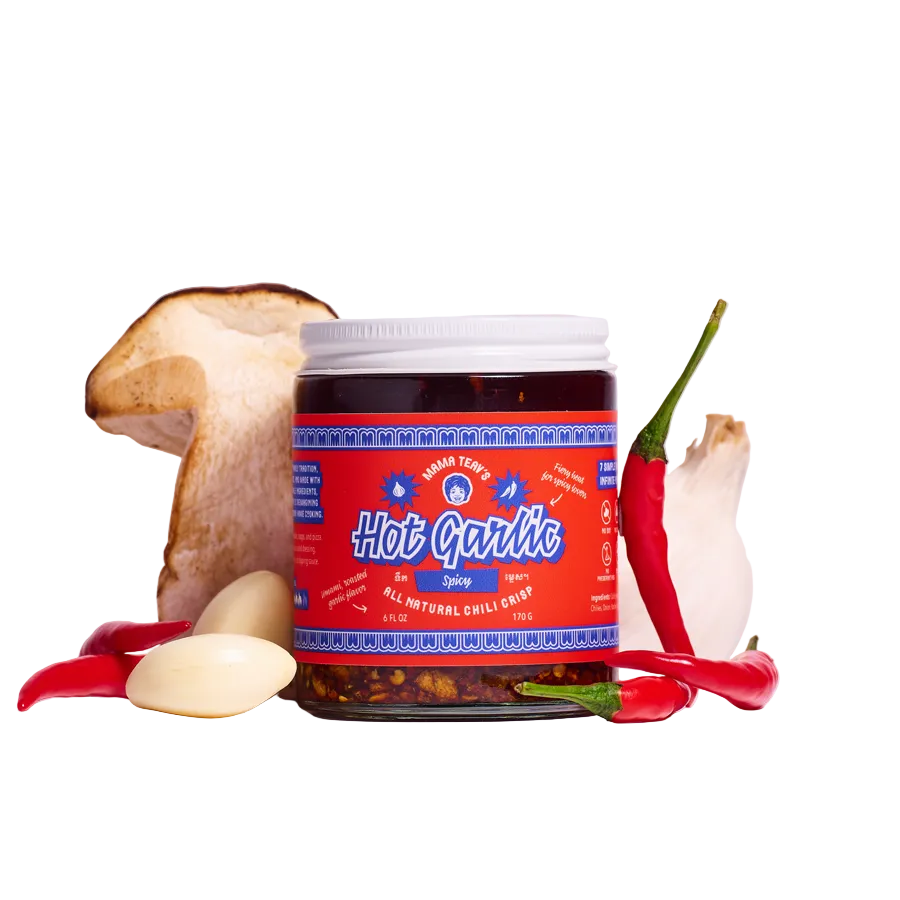 Jar of 'Hot Garlic' with garlic, chili peppers, and a mushroom on a white background