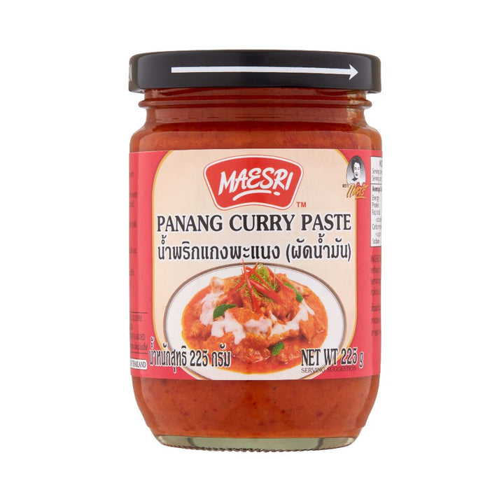 Glass jar of Maesri Panang Curry Paste on a white background
