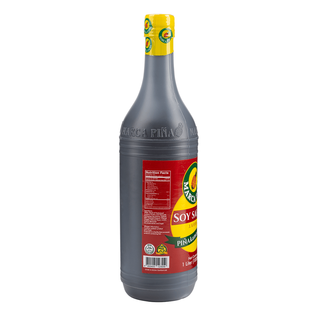 Bottle of soy sauce with a yellow cap on a white background