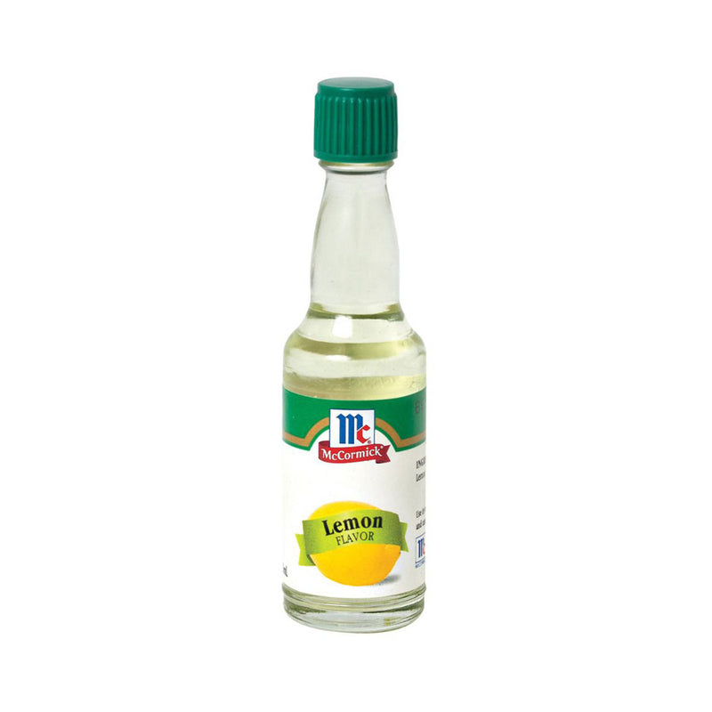 Bottle of McCormick lemon flavor extract on a white background