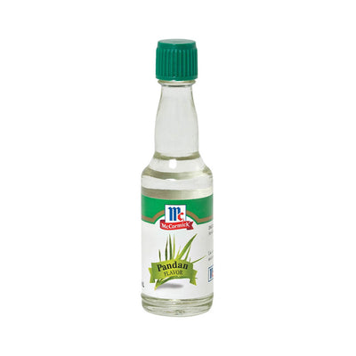 Small glass bottle of McCormick Pandan flavor extract on a white background