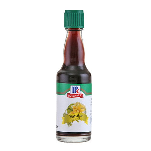 Bottle of McCormick vanilla extract on a white background