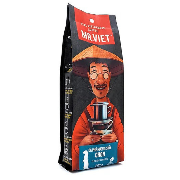 Mr. Viet coffee bag with a person holding a cup on a white background