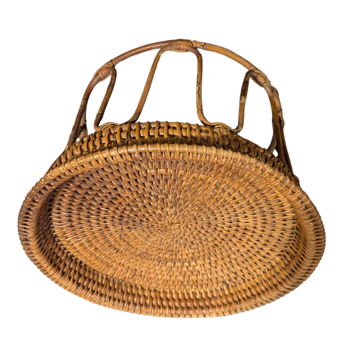 Aerial view of brown woven bamboo rattan table on a white background