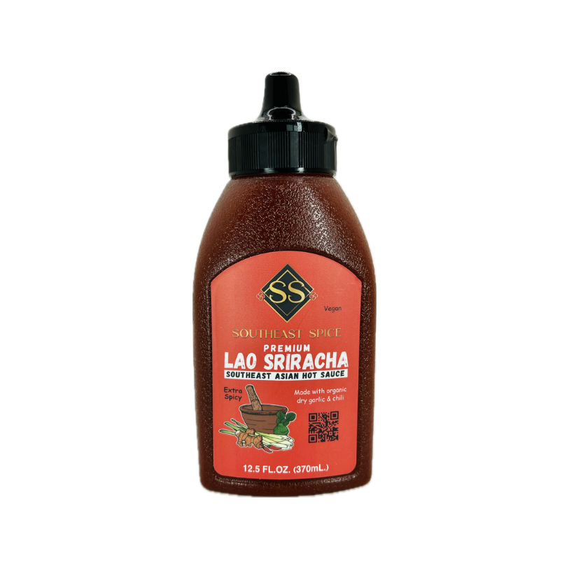 Bottle of Southeast Spice Premium Lao Sriracha with a red label, showcasing the brand logo and product name.
