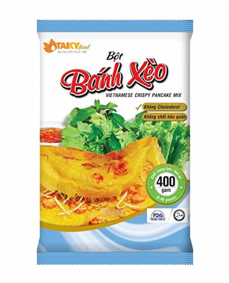 Plastic bag packaging of Vietnamese crispy pancake mix with a yellow omelette and green vegetables on a white background.