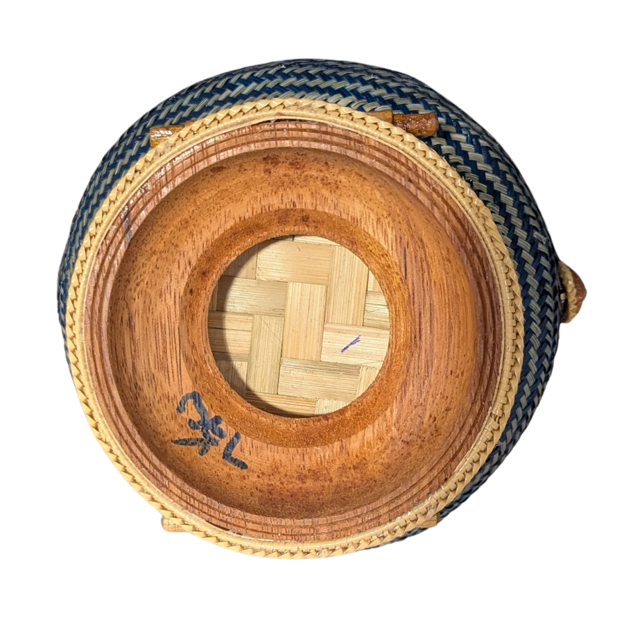 Wooden base of Lao sticky rice basket  with blue and gold decorative rim on a white background