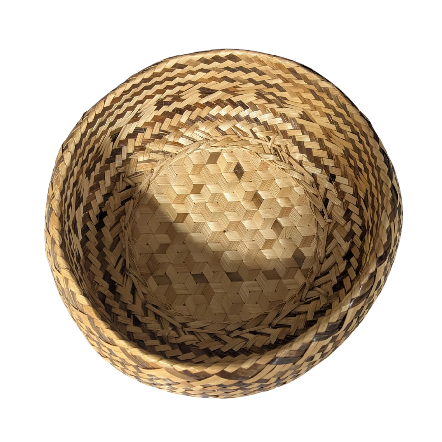 Woven bamboo basket on a white background