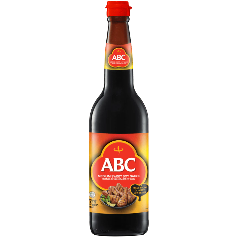 Glass bottle of ABC Medium Sweet Soy Sauce on a white background
