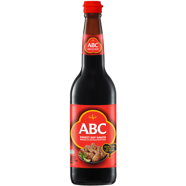 Glass bottle of ABC Sweet Soy Sauce on a white background