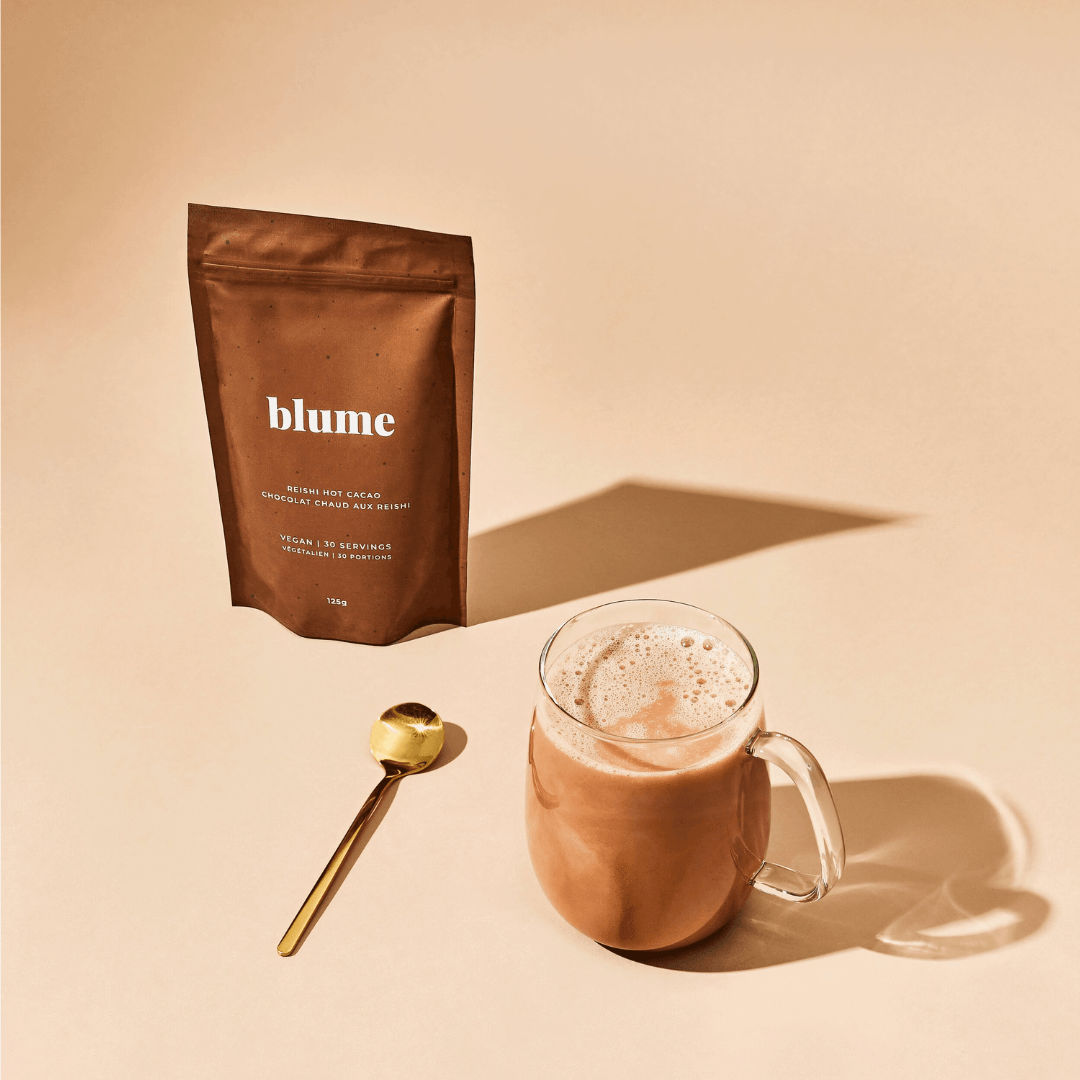 Blume coffee package with a glass of coffee and spoon on a beige background