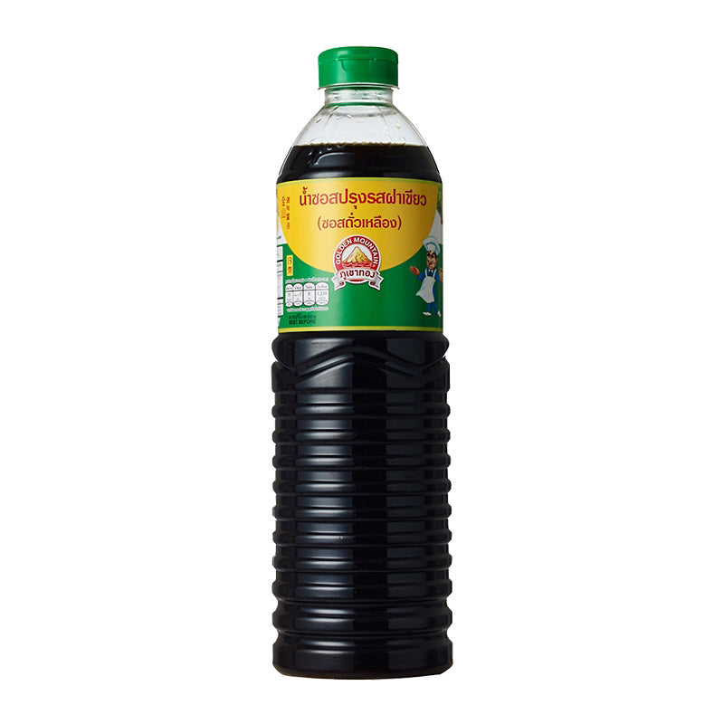 Bottle of Golden Mountain Seasoning Sauce with a green cap and label featuring Thai characters.