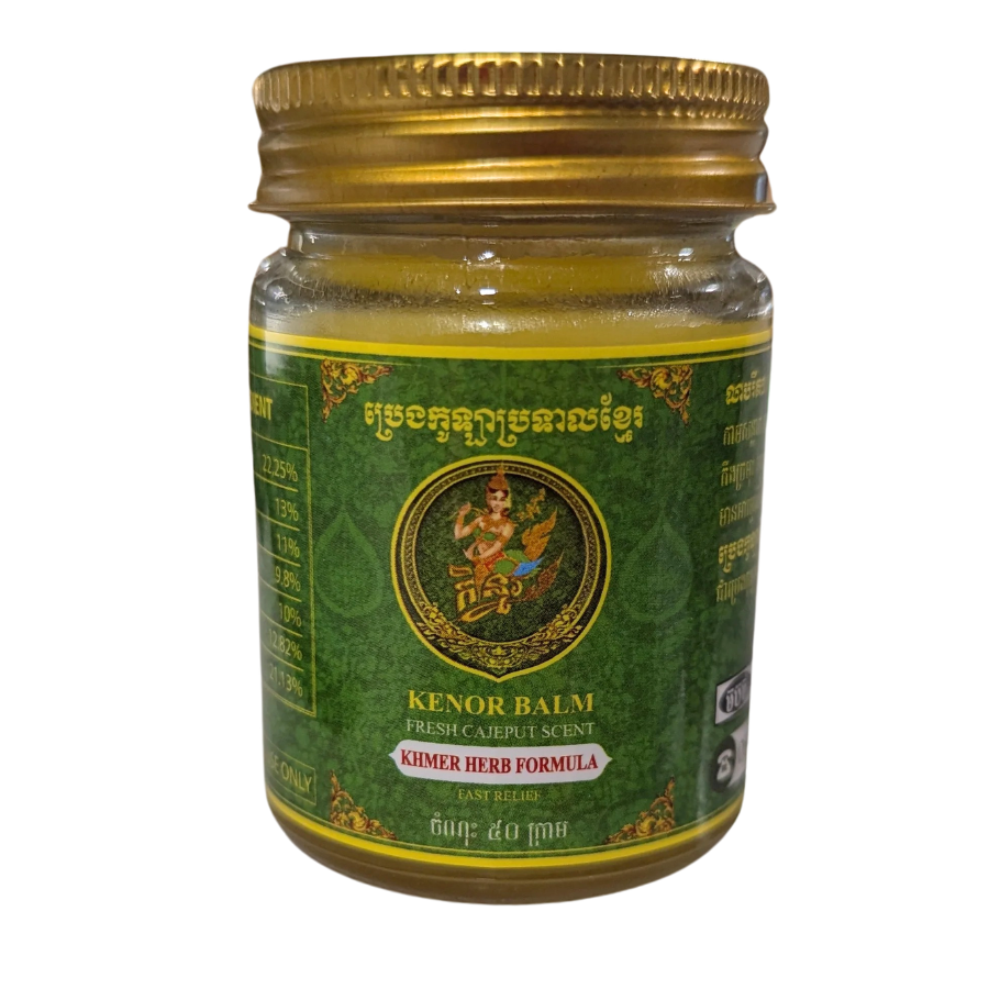 Jar of Kenor Balm with green label and gold lid on a white background
