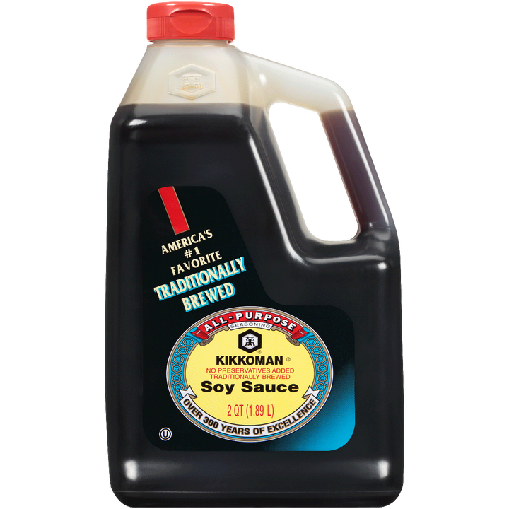 Kikkoman soy sauce bottle with red cap on a white background