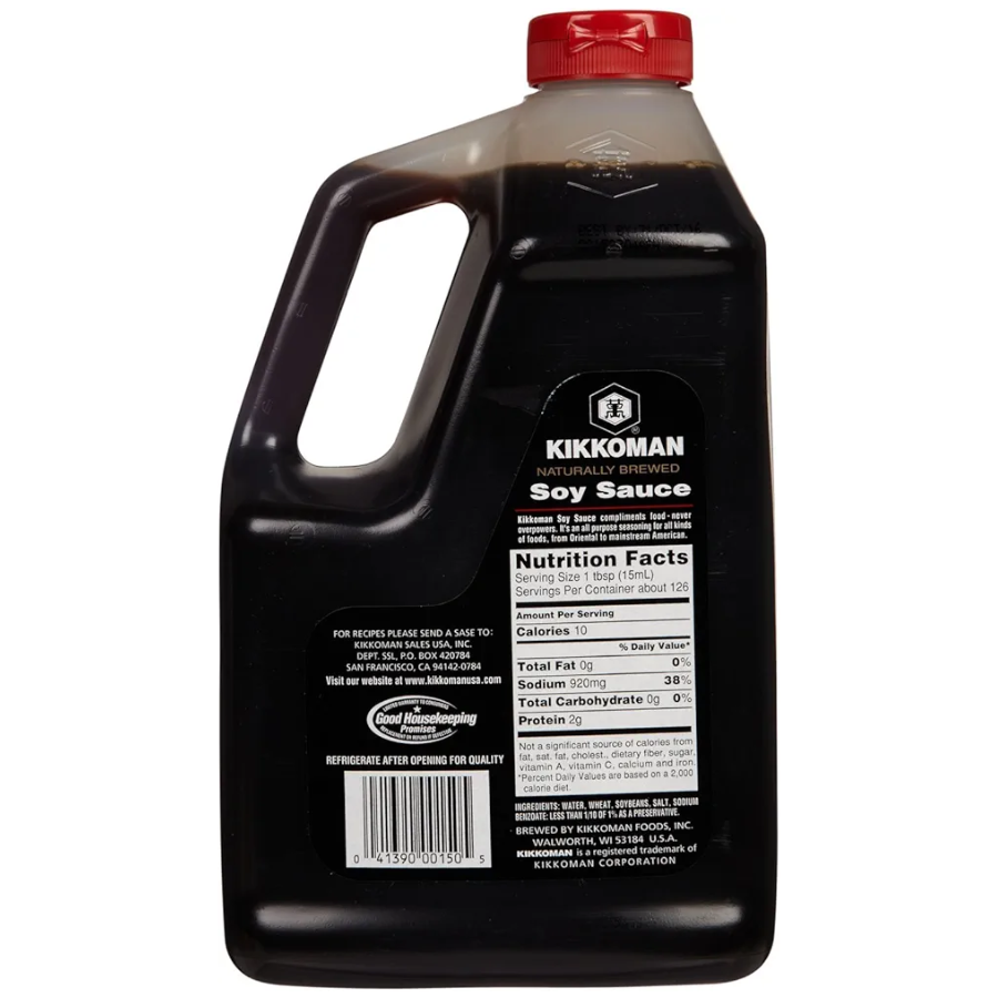 Kikkoman soy sauce bottle with a red cap on a white background