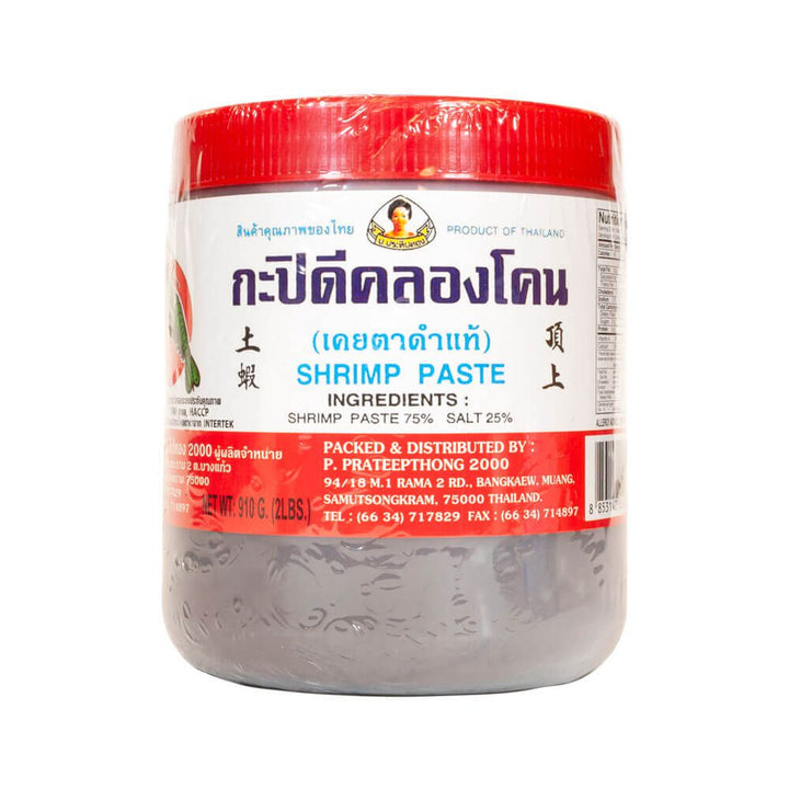 A plastic jar of Klong Kone Shrimp Paste with red and white labeling, indicating it is a product of Thailand.