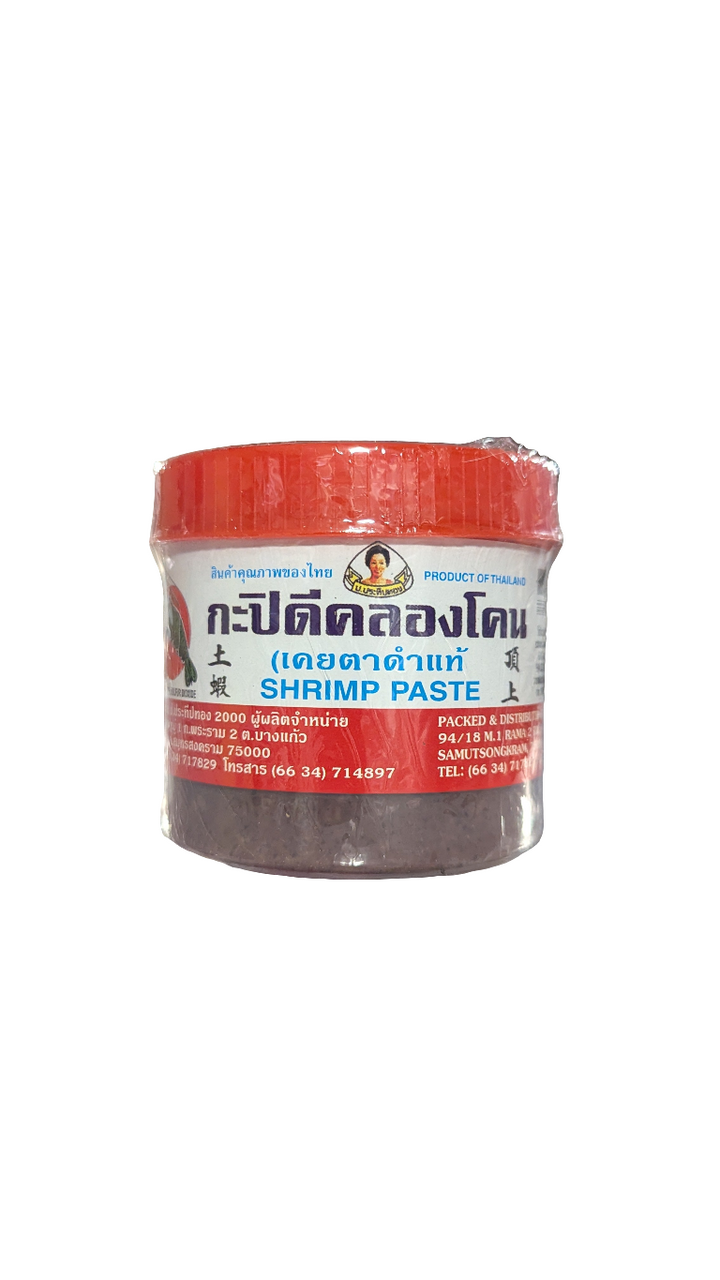 A plastic jar of Klong Kone Shrimp Paste with red and white labeling, indicating it is a product of Thailand.