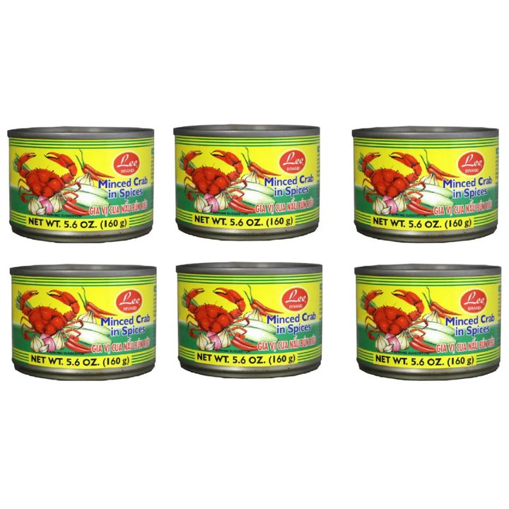 Six cans of Lobo Minced Crab in Spices on a white background