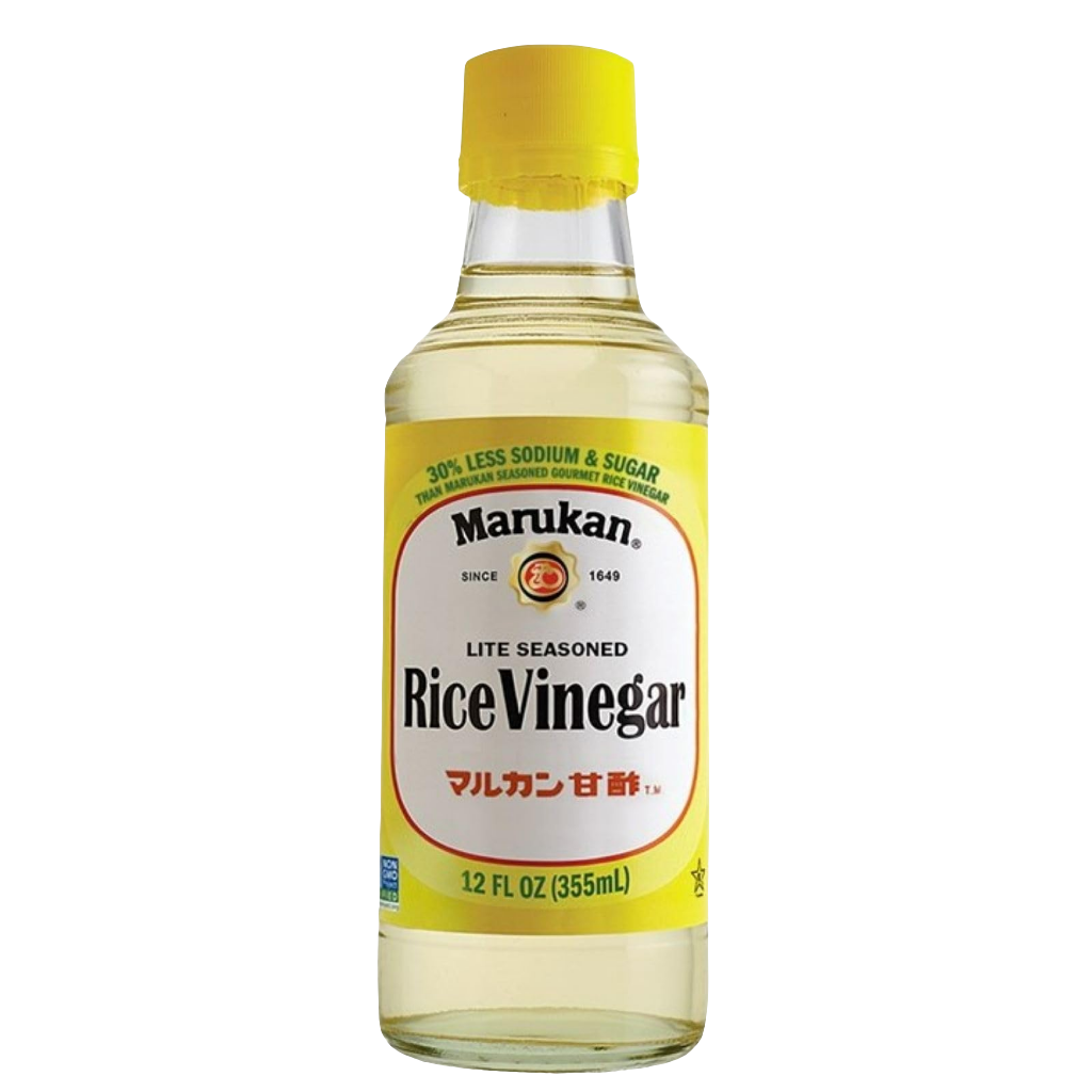 A bottle of Marukan Lite Seasoned Rice Vinegar Dressing with a yellow cap and label, indicating less sugar and sodium content.