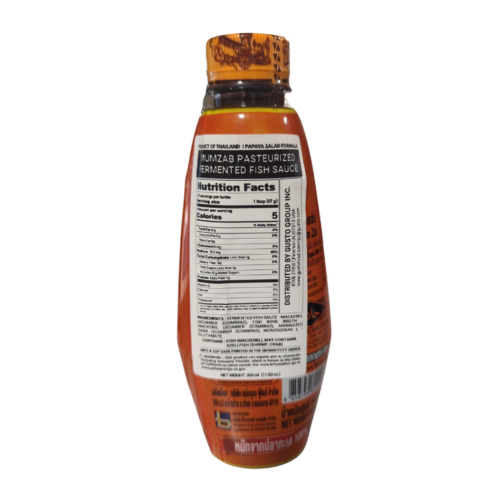 Bottle of fermented fish sauce with label on a white background