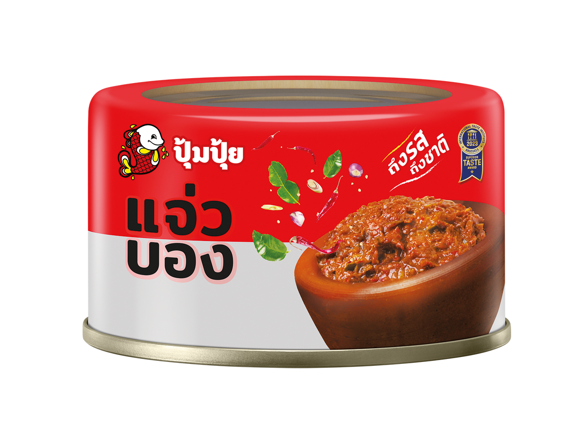 A can of Thai red chili paste (Hawker Chili Paste) on a solid white background. The can features a red top half with Thai text and a cartoon fish mascot, and a white bottom half displaying a photo of the thick red chili paste in a wooden bowl.