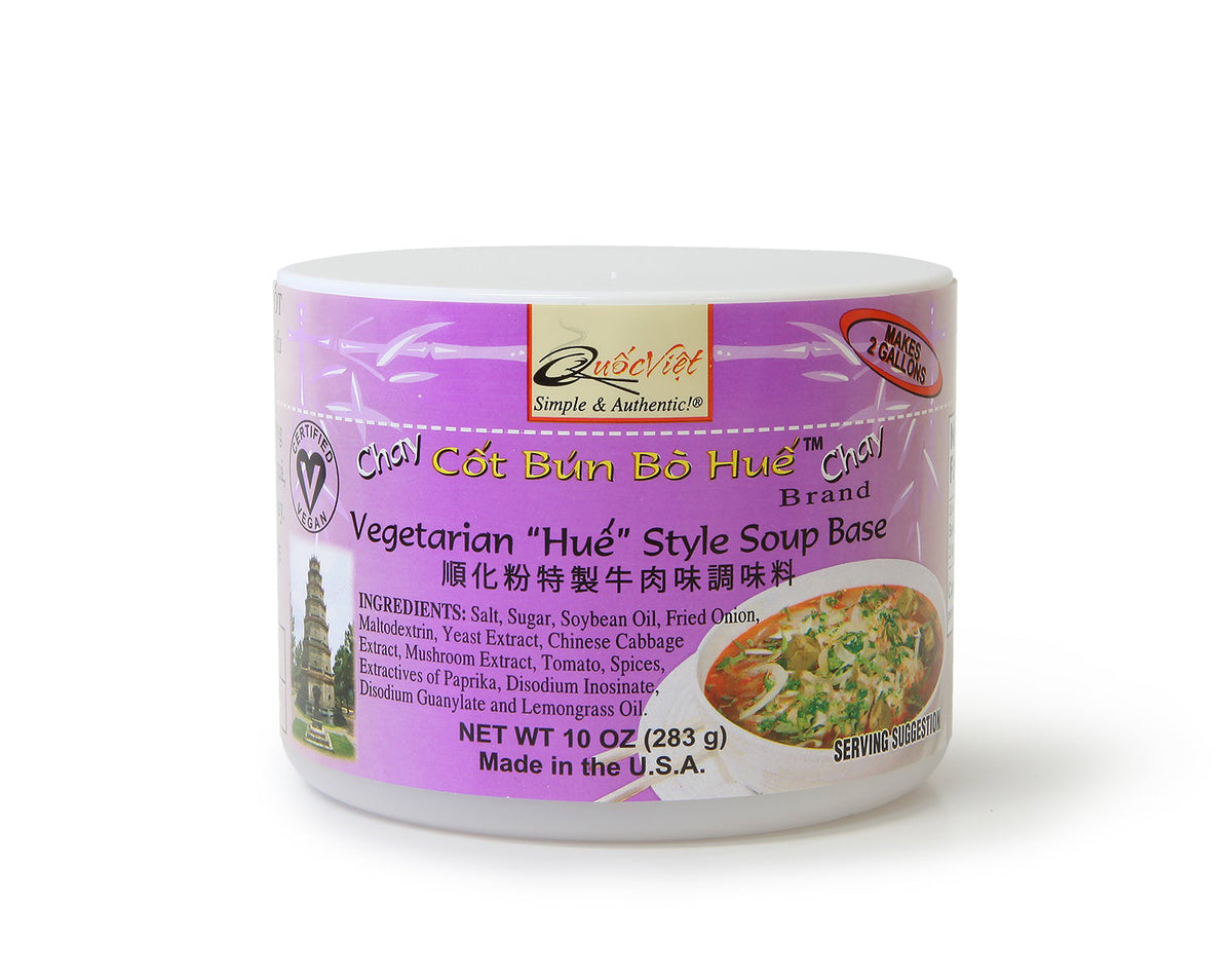 Container of Chay Cот Bun Bo Hue Vegetarian Hué Style Soup Base with purple label on white background