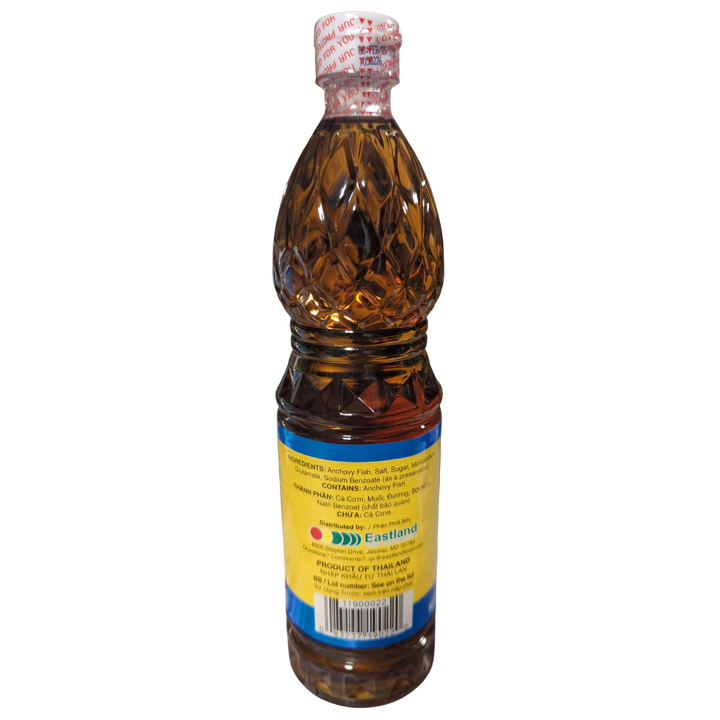 Bottle of fish sauce with a white background