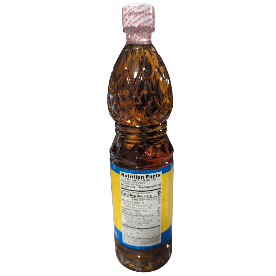 Bottle of syrup with a label on a white background