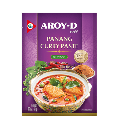 Packaging of Aroy-D Panang Curry Paste showing the product name, brand logo, and an image of a curry dish. The packet is purple with a Thai flag symbol, indicating the product is made in Thailand.