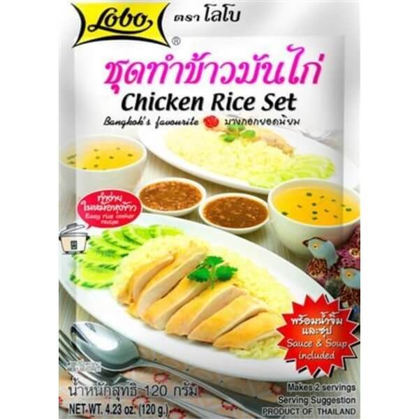 White rectangle plastic packaging of Lobo Chicken Rice Set with images of chicken, sliced cucumbers, rice, soup, dipping sauce, plus text detailing the product as a favorite in Bangkok and being Halal certified.