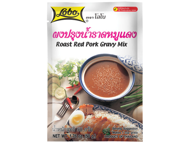 Rectangle plastic packaging of Lobo Roast Red Pork Gravy Mix, featuring an image of small bowl with the sauce, sliced cucumbers, Thai chili peppers, sprig of cilantro.