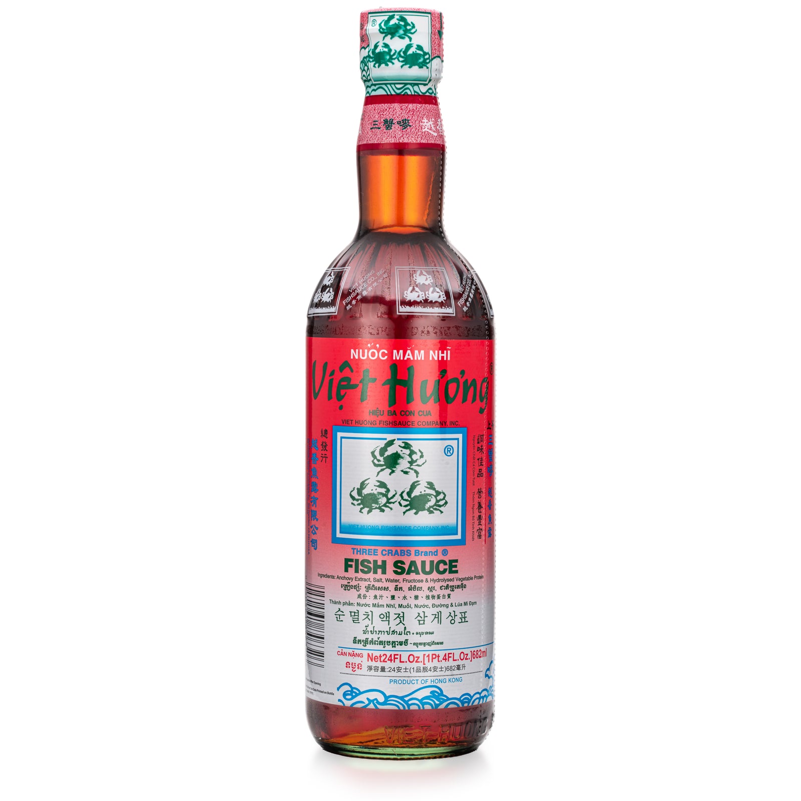 A bottle of Viet Huong Three Crabs Fish Sauce with label information in Vietnamese and Chinese.