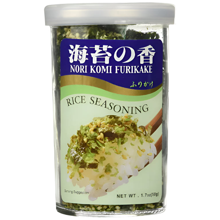 A clear glass jar of Nori Komi Furikake rice seasoning with a white lid and a blue and green label, shown on a white background.
