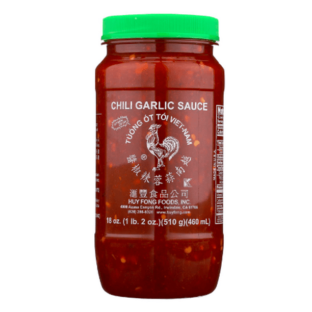 Huy Fong Chili Garlic Sauce in lime green cap, and clear 18 oz plastic bottle.