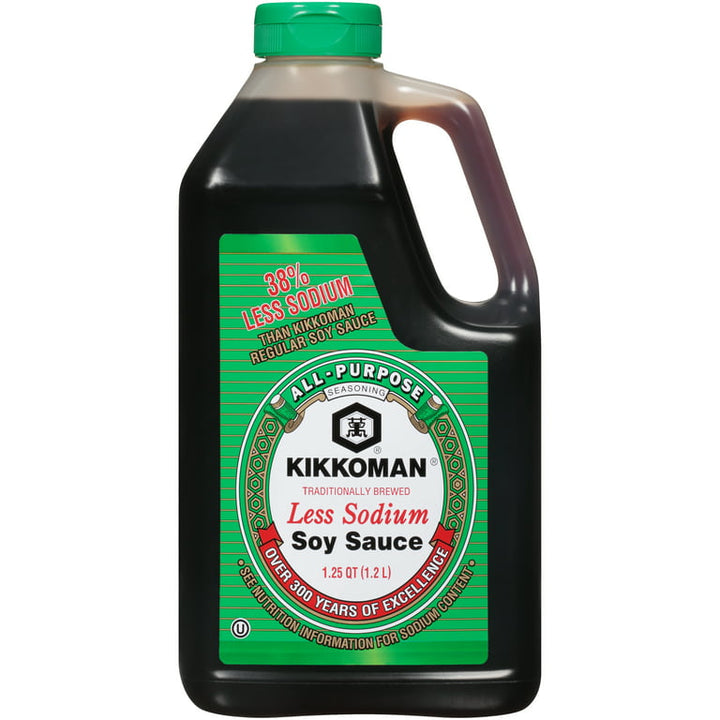 Kikkoman less sodium soy sauce bottle with green label on a white background